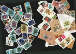 Large vintage used stamp collection featuring a range of stamps from around the world across the