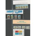 China and Hong Kong stamp collection featuring 4 presentation packs; Centenary of The Catholic