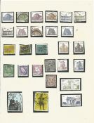 Ireland Stamps approx 800 used Eire Stamps on various loose Album pages Includes some with Gaelic