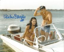 Martine Beswick signed 10 x 8 inch colour James Bond photo on boat with Sean Connery. Good