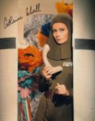 Blowout Sale! Moon Zero Two Catherine Schell hand signed 10x8 photo. This beautiful 10x8 hand signed