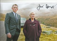 Dame Judi Dench M Handsigned 12x8 Colour Photo. Photo shows Dench standing alongside Daniel Craig