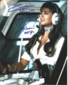 Caroline Munro Handsigned 10x8 Colour photo. Photo shows Munro in a Helicopter Scene during Bond