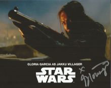 Star Wars 8x10 photo signed by actress Gloria Garcia as a Jakku villager. Good condition. All
