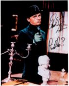Frank Gorshin The Riddler Handsigned 10x8 Colour Photo of himself holding a gun during a film set.
