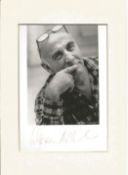 Actor Warren Mitchell signed black and white postcard mounted to a size of 7x5. Warren Mitchell