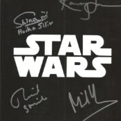 Star Wars photo signed by four actors inc Richard Stride, Kamay Lau, Michael Henbury. Good