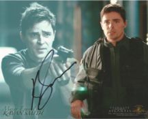 Kavan Smith signed 10x8 colour Stargate photo. Canadian actor known for playing Major Evan Lorne