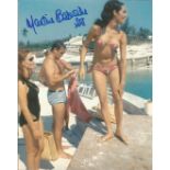 Martine Beswick signed 10 x 8 inch colour James Bond photo on pier with Sean Connery. Good