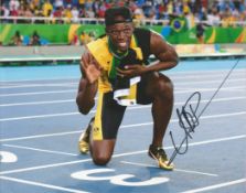 Usain Bolt retired Jamaican sprinter 10x8 signed colour photo. Good condition. All autographs come