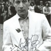 Charlie Watts signed 12x8 B/W photo, slightly grainy. Charlie Watts is best known as the drummer for