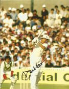 Cricket. David Gower signed 10x8 colour photo. Photo shows Gower batting the ball. Good condition.