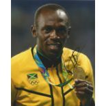 Usain Bolt retired Jamaican sprinter 10x8 signed colour photo. Good condition. All autographs come