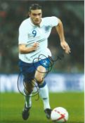 Football Andy Carroll 10x8 signed colour photo pictured in action for England. Good condition. All