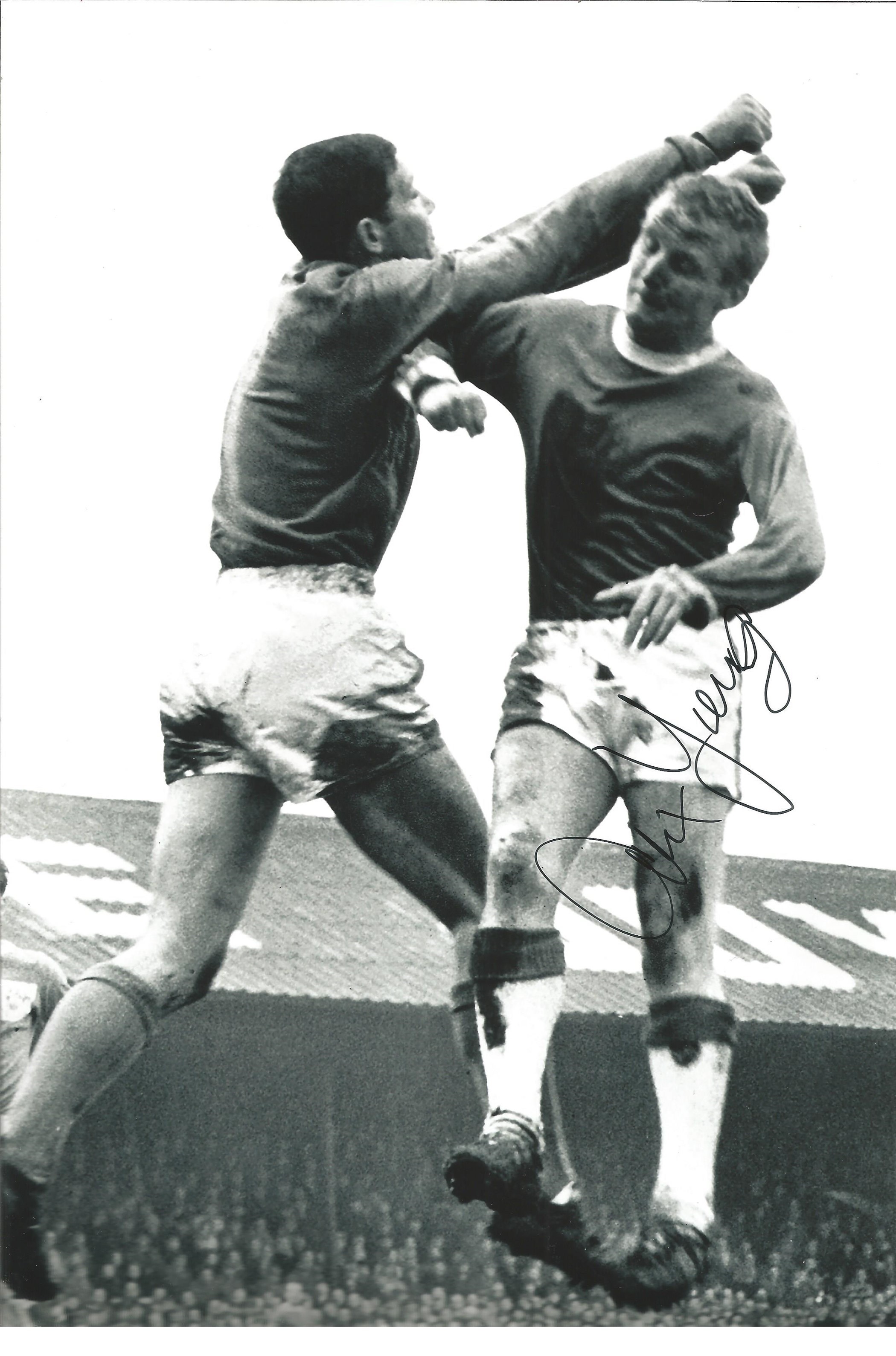 Alex Young Everton Signed 12 x 8 inch football photo. Good condition. All autographs come with a