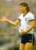 Football. Mick Duxbury Signed 16x12 colour photo. Photo is showing Duxbury in action for England,