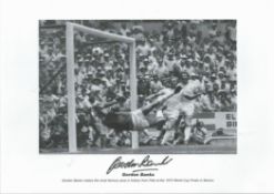 Football, Gordon Banks signed 16x12 black and white photograph pictured as he makes the most