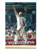 Cricket. Shane Warne Signed 10x8 colour photo. Photo shows Warne Celebrating during a Cricket Match.
