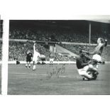 Alex Young Everton Signed 12 x 8 inch football photo. Good condition. All autographs come with a
