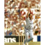 Cricket. Sir Ian Botham Signed 10x8 colour photo. Photo shows Botham during an England Cricket