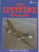 Michael J. F. Bowyer. The Spitfire 50 years on. A WW2 paperback book in good condition. Signed by