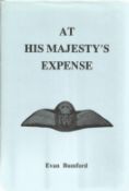 Evan Bumford. At His Majesty's Expense. A WW2 hardback book in great condition. Dedicated and signed