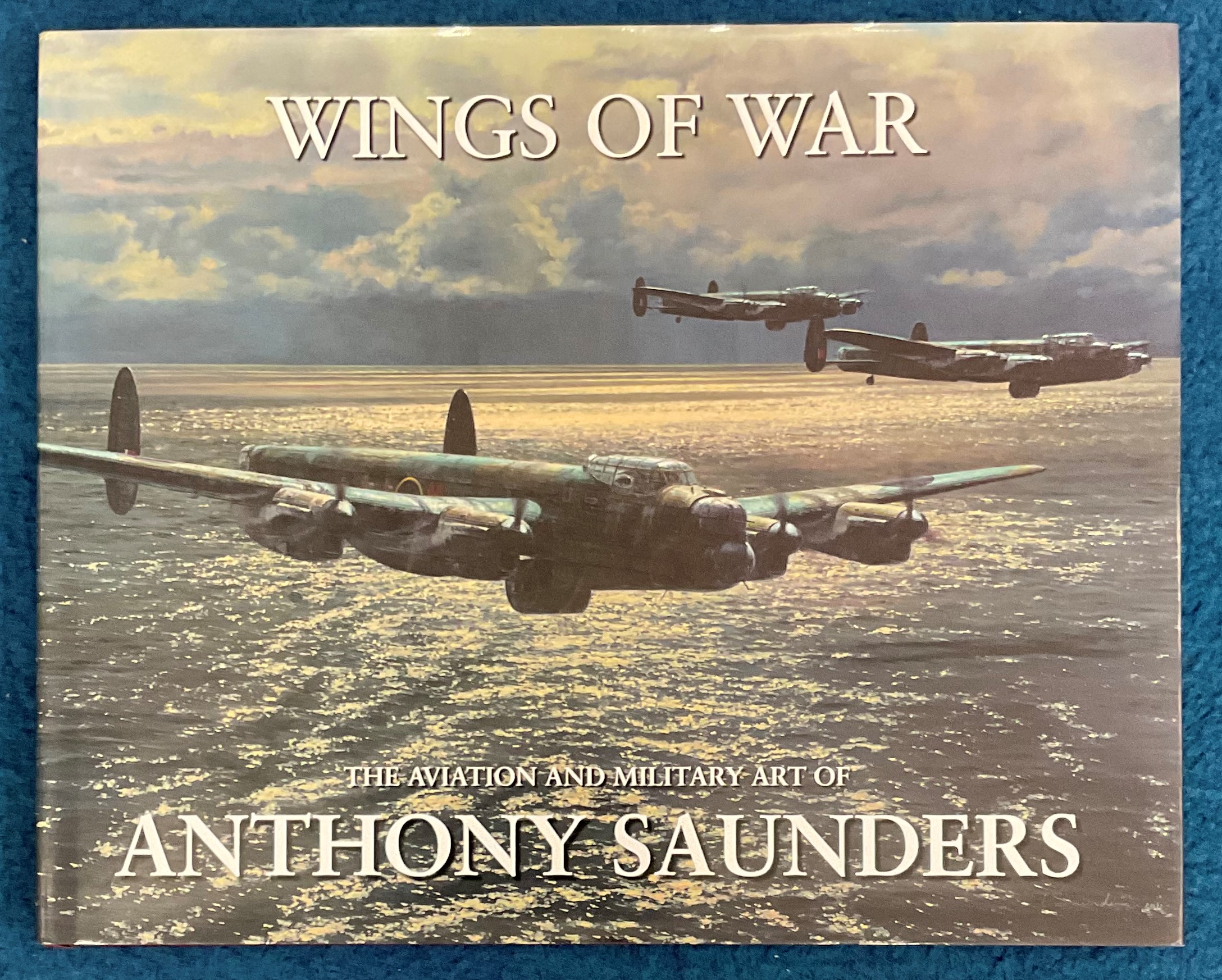 WW2. Anthony Saunders Multi Signed Book titled 'Wings of War' First Edition hardback book.