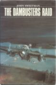 WW2. John Sweetman Multi Signed Book Titled 'The Dambusters Raid'. Signed on Title page by the