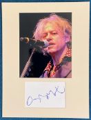 Bob Geldof signature piece in autograph presentation. Mounted with photograph to approx. 16 x 12