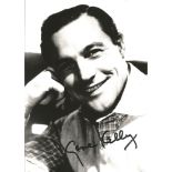 Gene Kelly signed 7x5 black and white photo. Good condition Est.