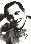 Gene Kelly signed 7x5 black and white photo. Good condition Est.