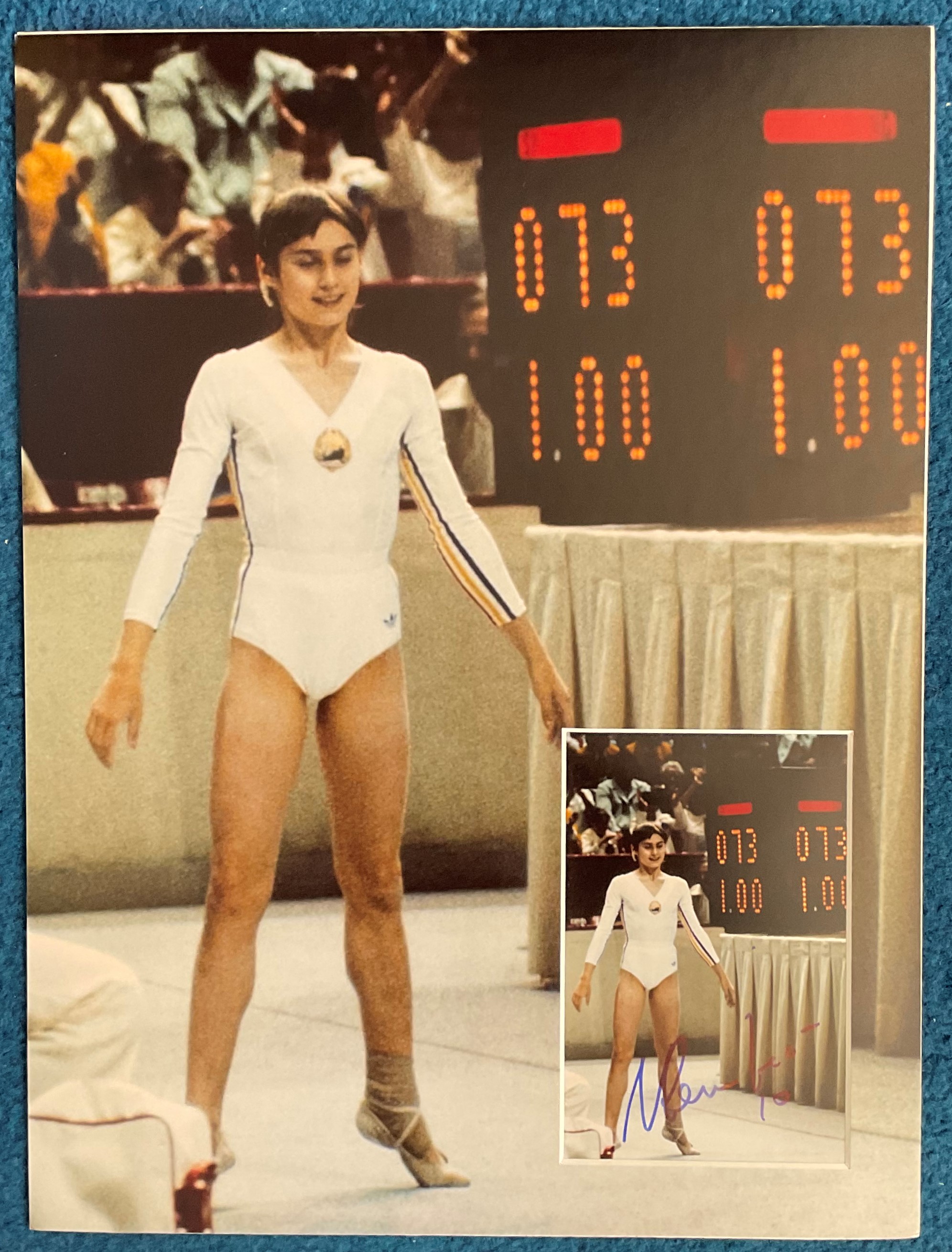 Nadia Comaneci Signed 6x4 inch colour photo, attached to a blown up photo mount showing the same - Image 2 of 2