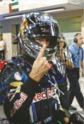 Sebastian Vettel signed 12x8 inch colour photo pictured during his time with Red Bull during his