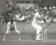 David Gower signed 10x8 inch black and white action photo. Good condition Est.