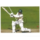 Justin Langer signed 10x8 inch colour cricket batting photo. Good condition Est.