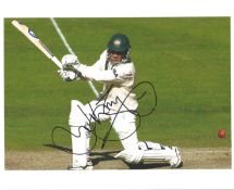 Justin Langer signed 10x8 inch colour cricket batting photo. Good condition Est.