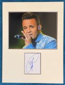 Aston Merrygold, JLS, signature piece in autograph presentation. Mounted with photograph to