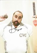 Asim Chaudhry signed 12x8 inch colour photo. Asim Chaudhry is a British comedian, writer, director