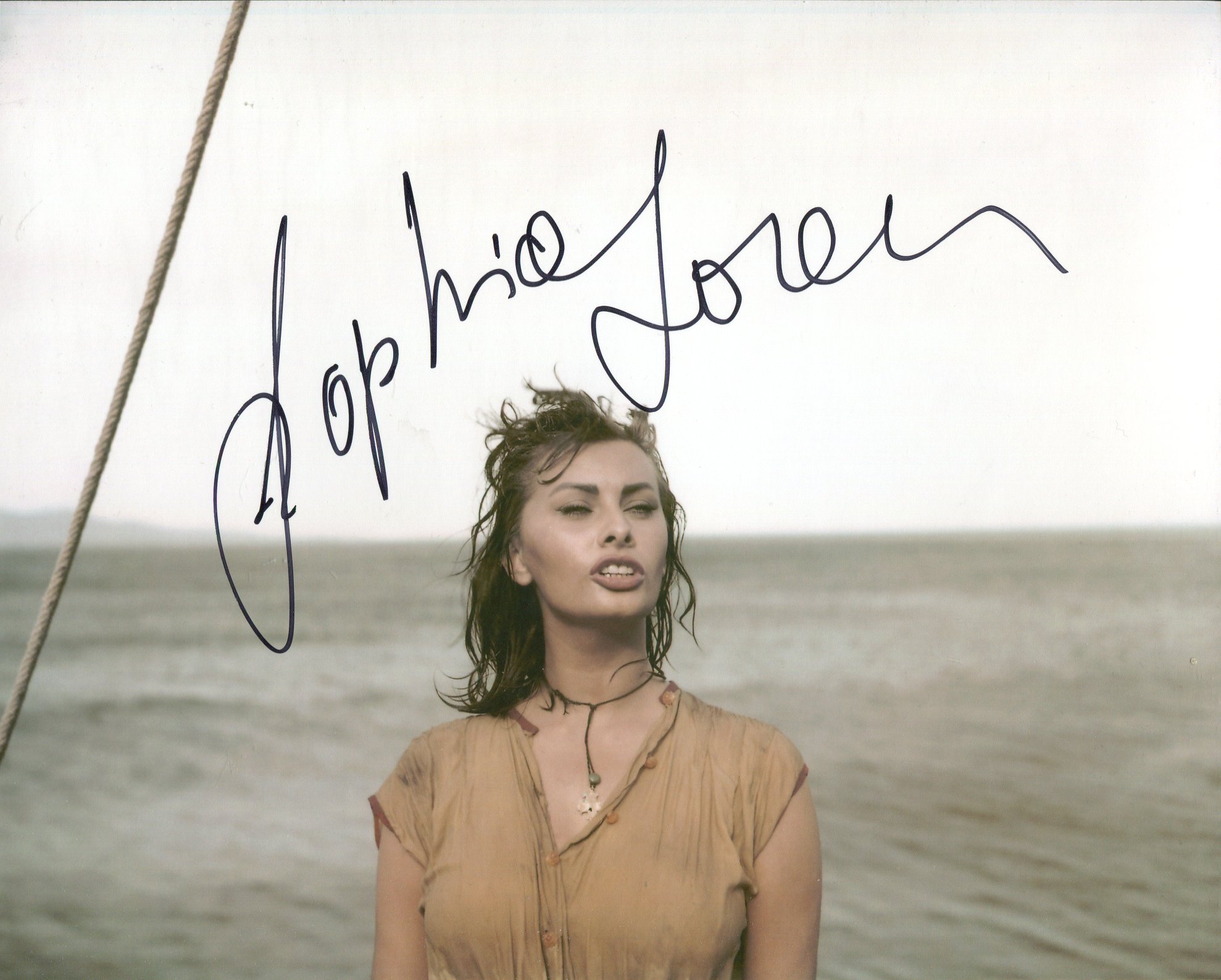 Sophia Loren signed 8x10 photo from the film Boy on a Dolphin. Good condition Est.