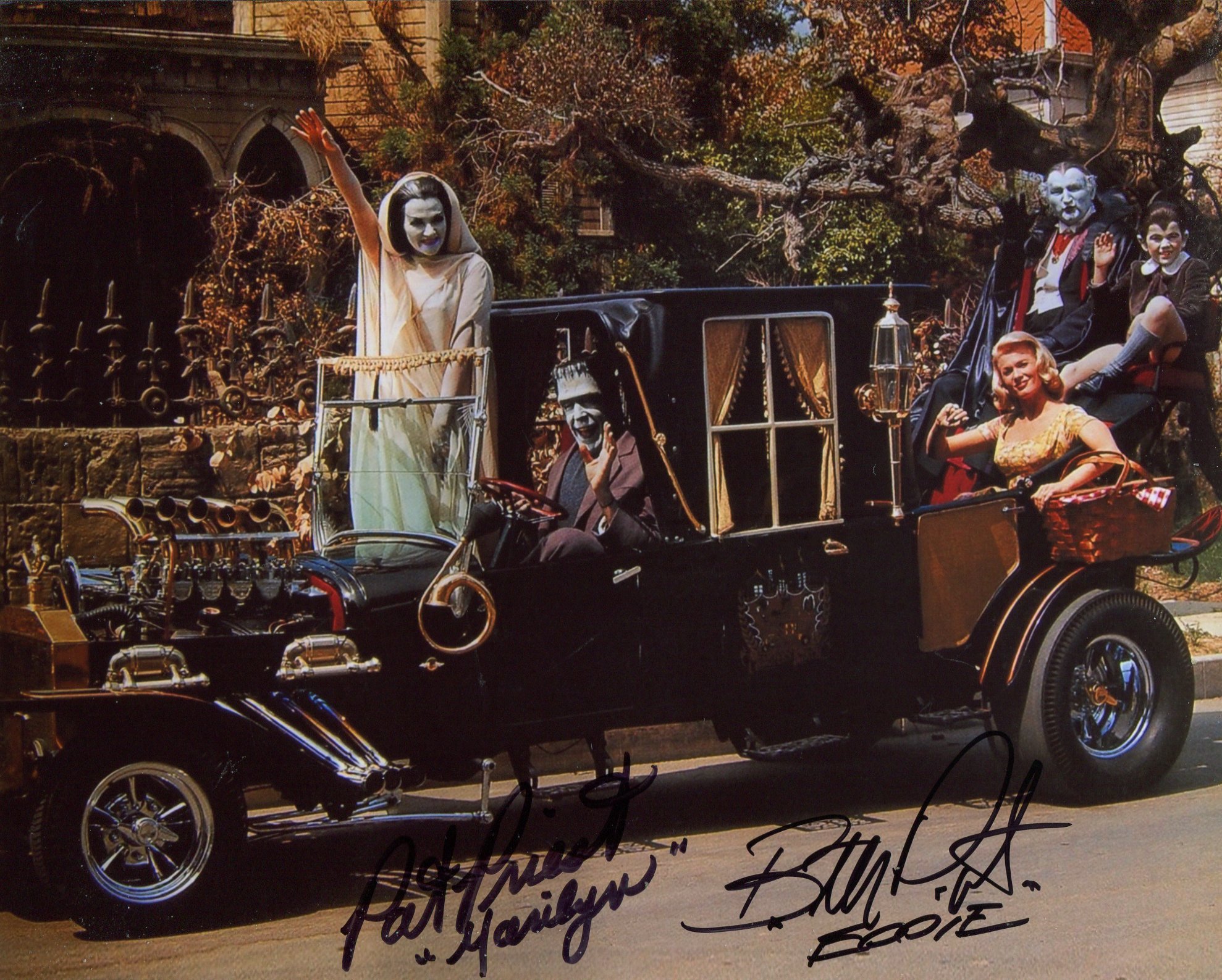 The Munsters 8x10 photo signed by Pat Priest as Marilyn Munster and Butch Patrick as Eddie