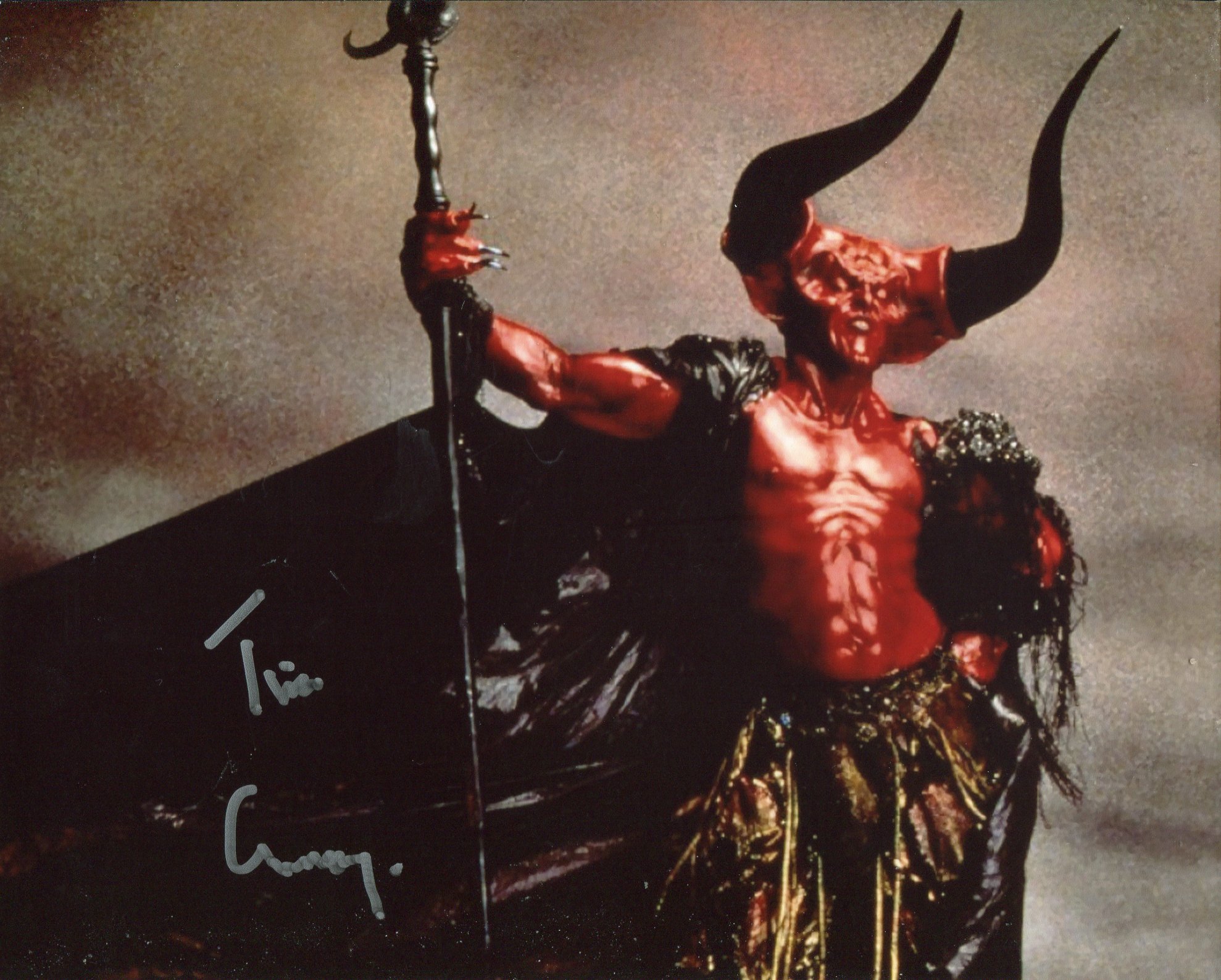 Tim Curry signed 8x10 photo from the film 'Legend'. Good condition Est.