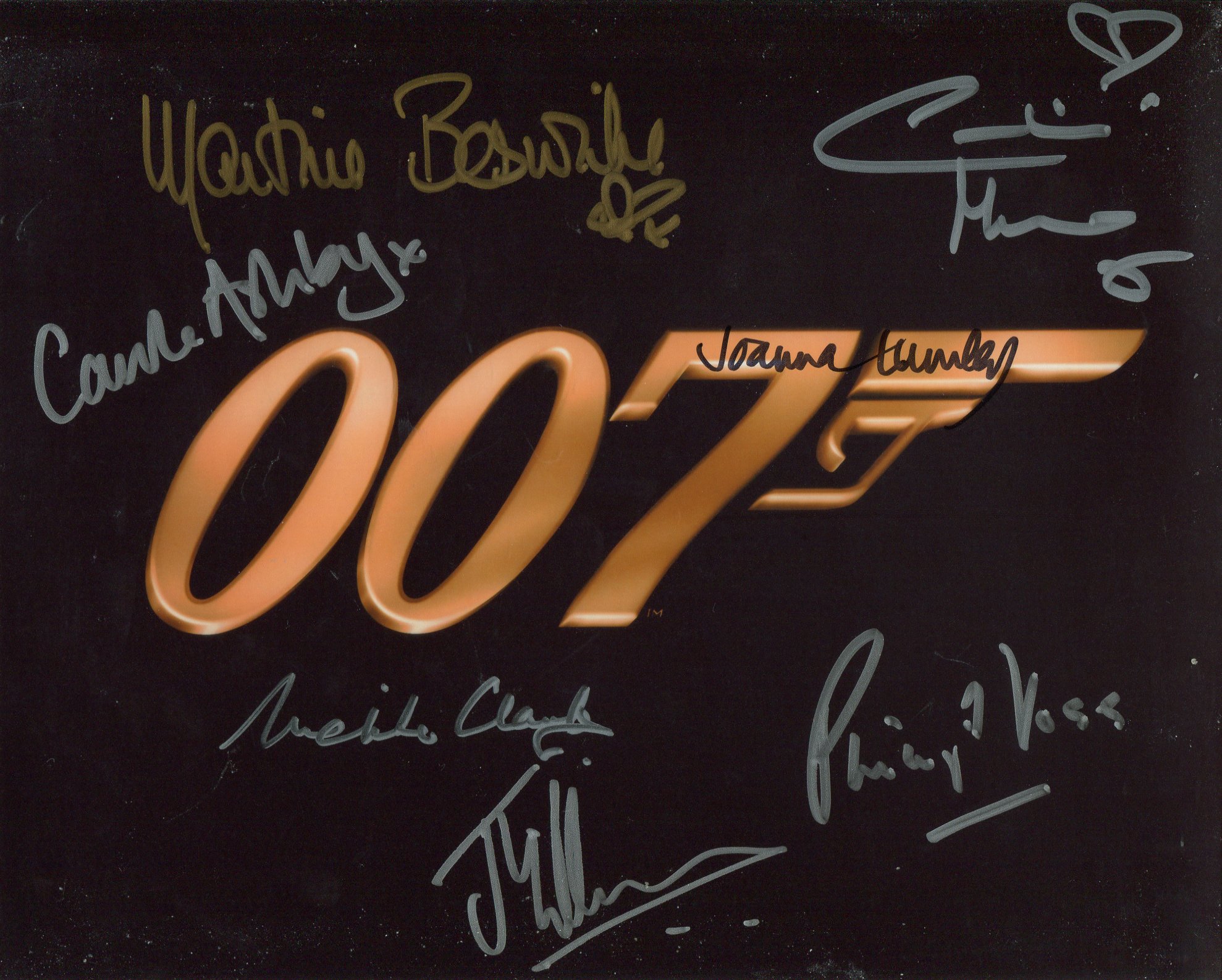 007 James Bond photo signed by SEVEN stars who appeared in a Bond movie, these are Joanna Lumley,