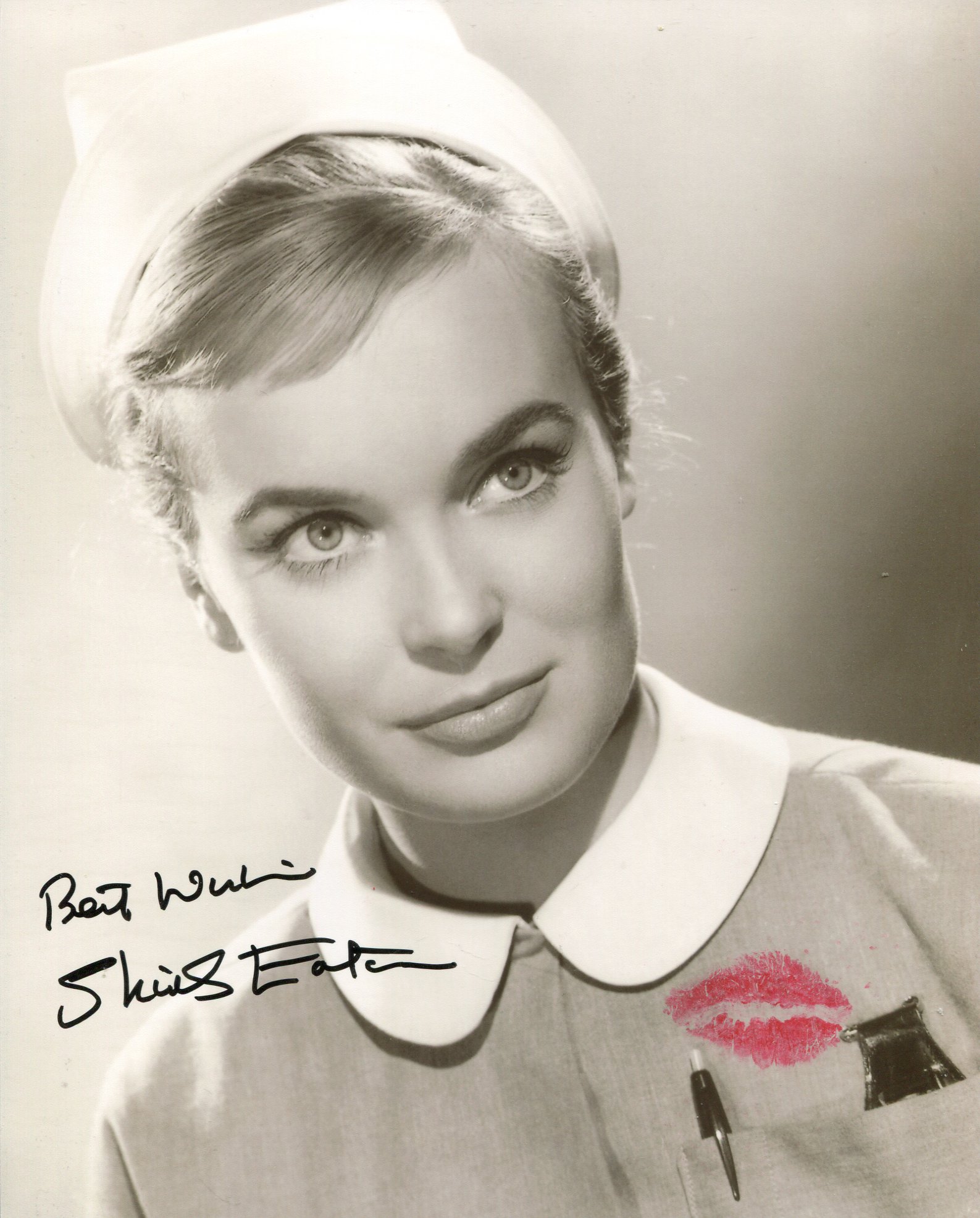 Carry On Nurse 8x10 inch photo signed by Shirley Eaton who has also physically kissed this photo