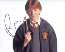 Harry Potter movie photo signed by actor Rupert Grint as Ron Weasley. Good condition Est.