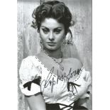 Sophia Loren signed sexy 12 x 8 inch black and white photo. Good condition Est.