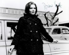 Diana Rigg signed 10x8 inch black and white vintage photo. Good condition. All autographs come