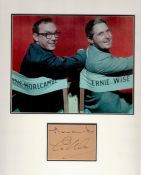 Morecambe and Wise 13x13 approx mounted signature piece includes signed album page and a superb