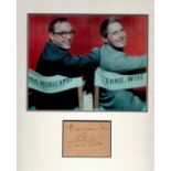 Morecambe and Wise 13x13 approx mounted signature piece includes signed album page and a superb