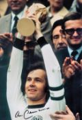 Franz Beckenbauer signed 12x8 colour photo pictured lifting the World Cup in 1974. Franz Anton