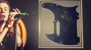 Harry Styles 23x13 overall mounted signature display includes a signed mounted guitar plate and